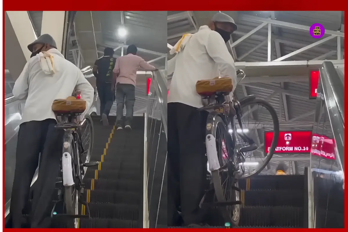 Man seen with bicycle on escalator